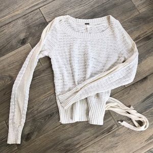 Gently used open back tie sweater